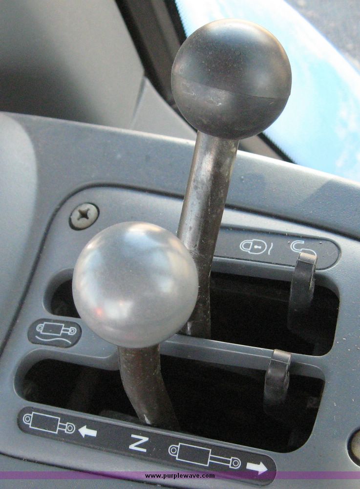 image for item 6611 1998 New Holland TV140 bi-directional 4WD tractor