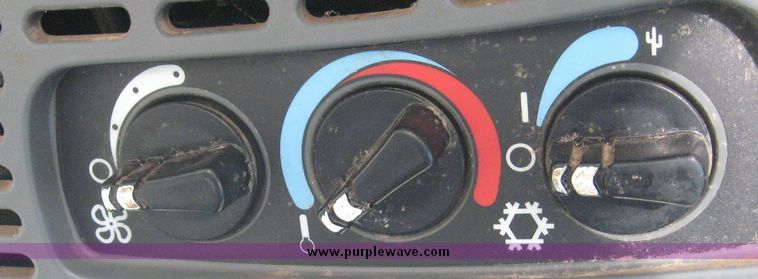 image for item 6611 1998 New Holland TV140 bi-directional 4WD tractor