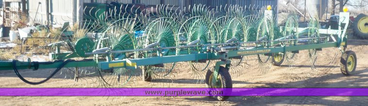 image for item 7002 2006 John Deere 704 wheel rake
