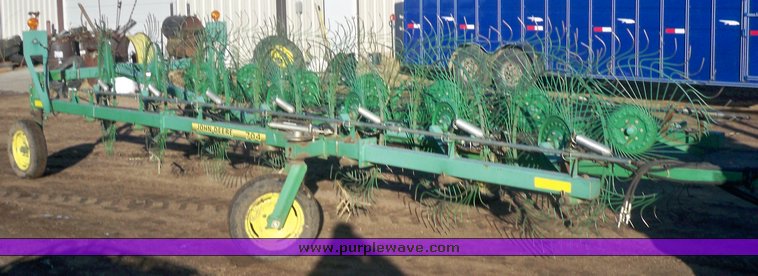 image for item 7002 2006 John Deere 704 wheel rake