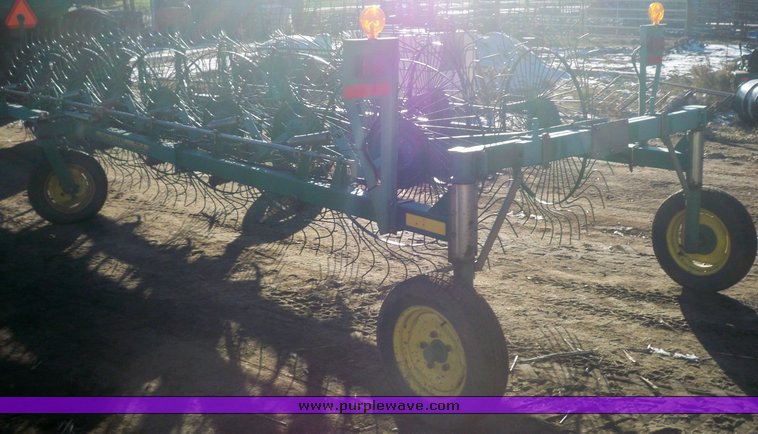 image for item 7002 2006 John Deere 704 wheel rake