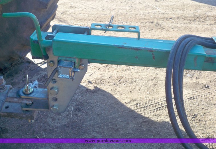 image for item 7002 2006 John Deere 704 wheel rake