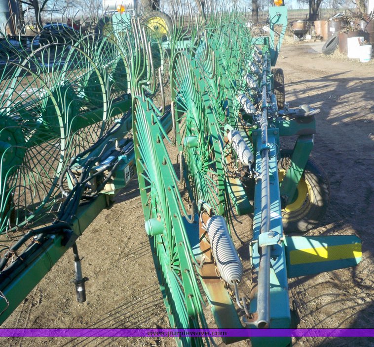 image for item 7002 2006 John Deere 704 wheel rake