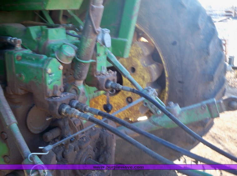 image for item 7002 2006 John Deere 704 wheel rake