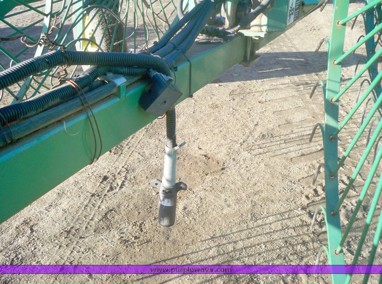 image for item 7002 2006 John Deere 704 wheel rake