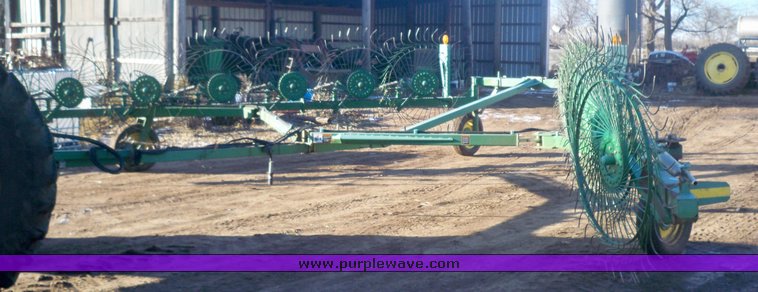 image for item 7002 2006 John Deere 704 wheel rake