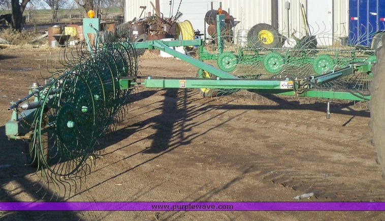 image for item 7002 2006 John Deere 704 wheel rake