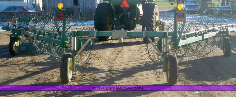 image for item 7002 2006 John Deere 704 wheel rake