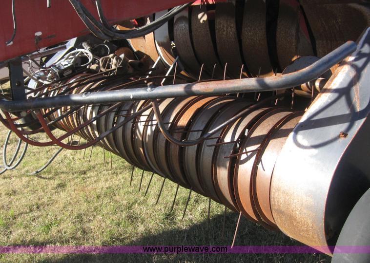 image for item 9001 1998 Case IH 8590 large square 4x4 baler