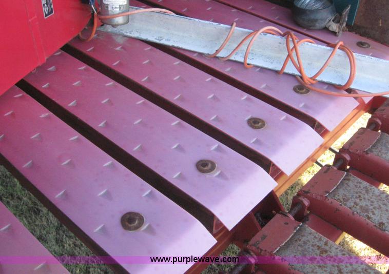 image for item 9001 1998 Case IH 8590 large square 4x4 baler