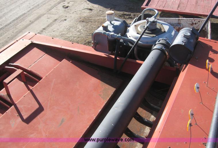 image for item 9001 1998 Case IH 8590 large square 4x4 baler