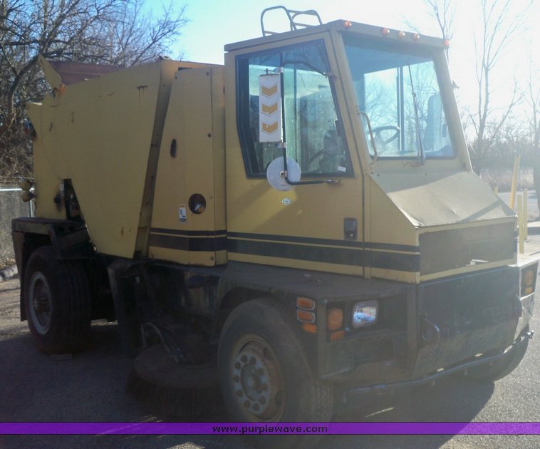 image for item 6001 1985 FMC street sweeper