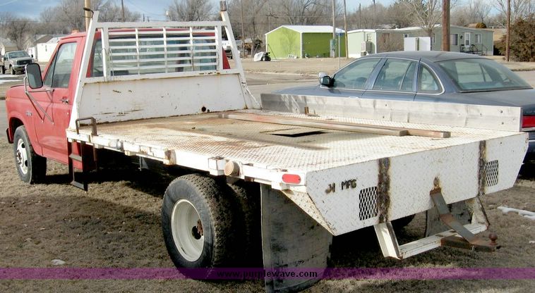image for item 3758 1984 Ford F-350 pickup with 11' flatbed