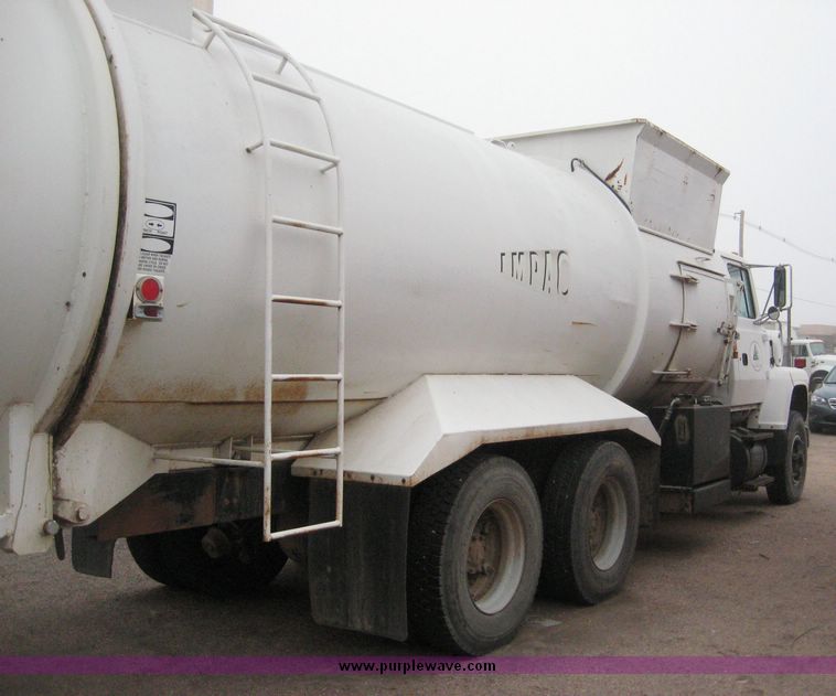 image for item 3805 1994 Ford L8000 tandem axle truck with Impac trash body