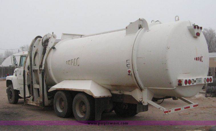 image for item 3805 1994 Ford L8000 tandem axle truck with Impac trash body
