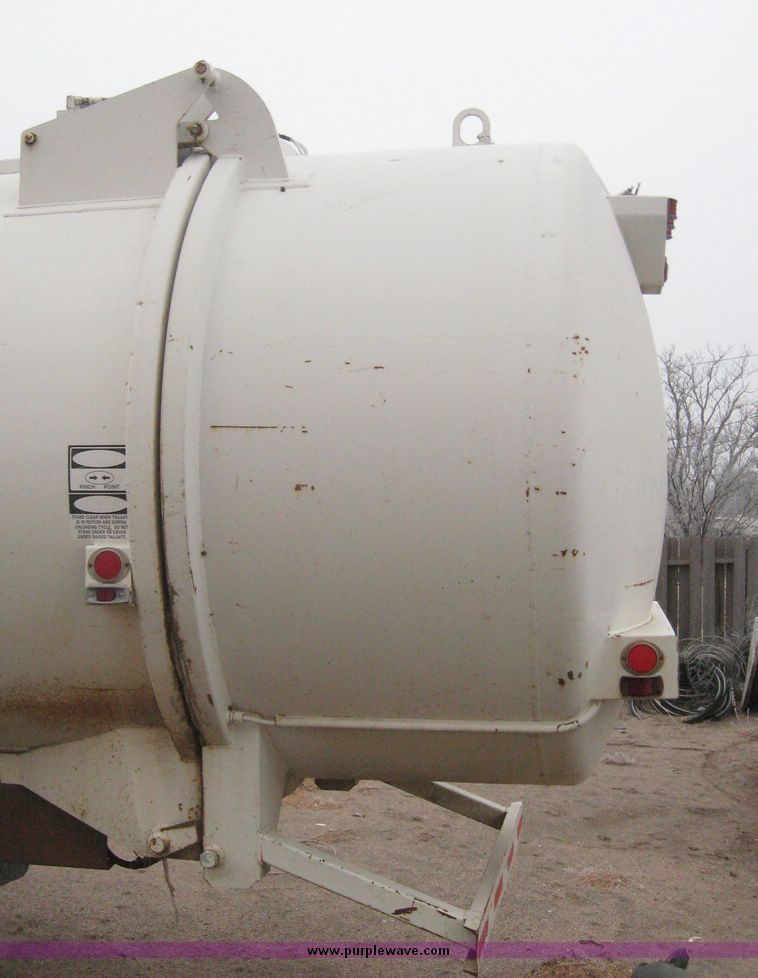 image for item 3805 1994 Ford L8000 tandem axle truck with Impac trash body