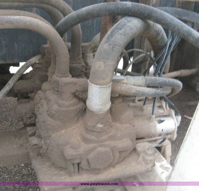 image for item 3805 1994 Ford L8000 tandem axle truck with Impac trash body