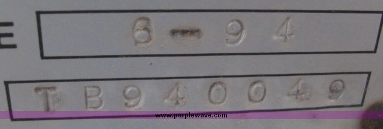 image for item 3805 1994 Ford L8000 tandem axle truck with Impac trash body