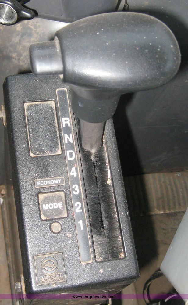 image for item 3805 1994 Ford L8000 tandem axle truck with Impac trash body