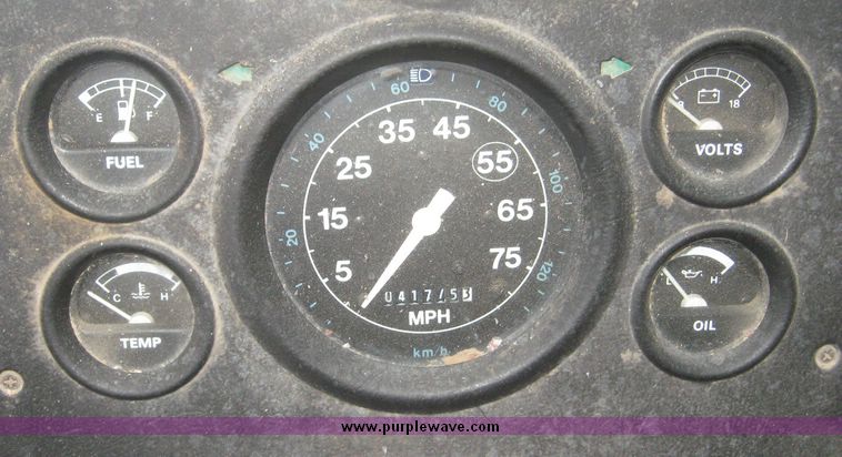 image for item 3805 1994 Ford L8000 tandem axle truck with Impac trash body