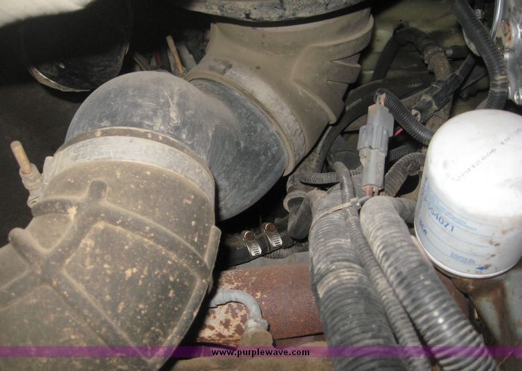 image for item 3805 1994 Ford L8000 tandem axle truck with Impac trash body