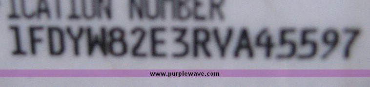 image for item 3805 1994 Ford L8000 tandem axle truck with Impac trash body