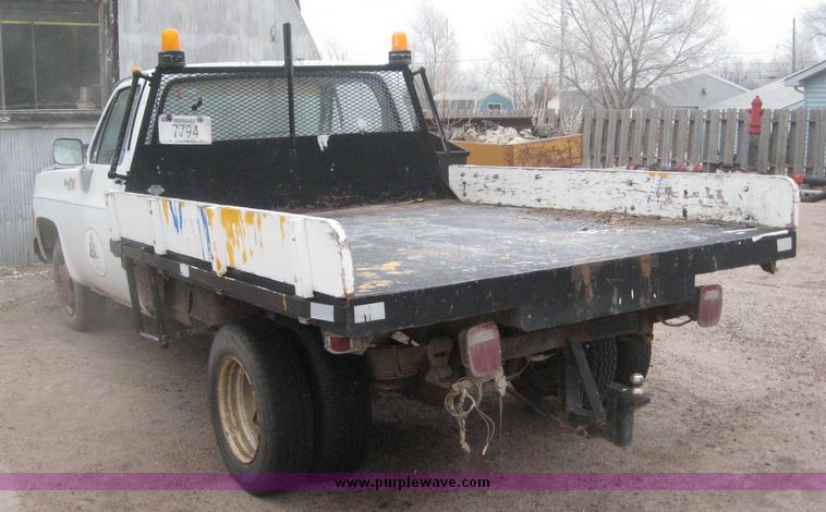 image for item 3807 1978 GMC Sierra 3500 pickup with 8' flatbed