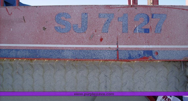 image for item 1004 2004 Skyjack SJ 7127 scissor lift