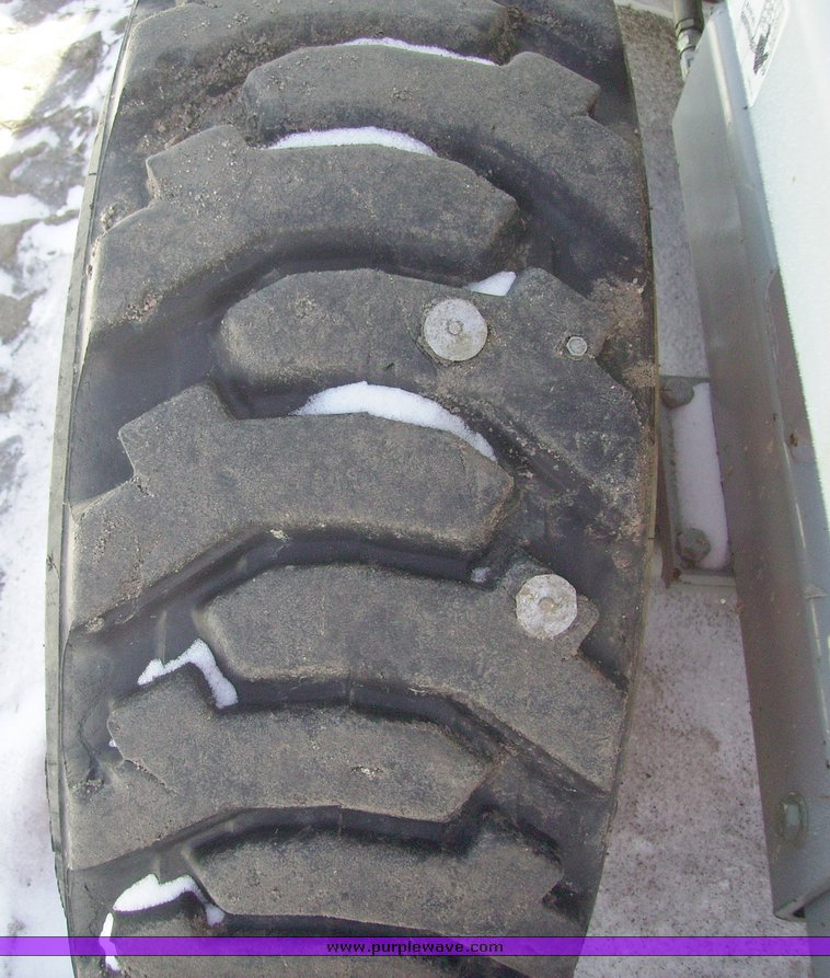 image for item 1004 2004 Skyjack SJ 7127 scissor lift