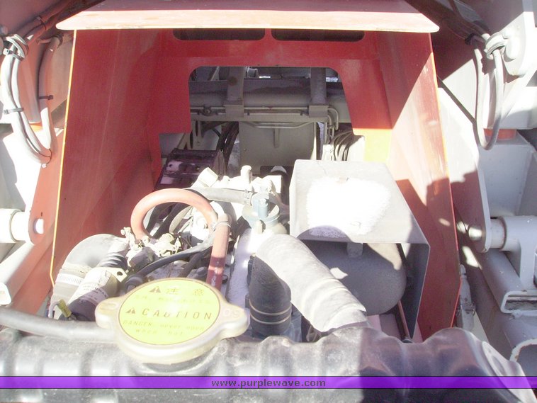 image for item 1004 2004 Skyjack SJ 7127 scissor lift