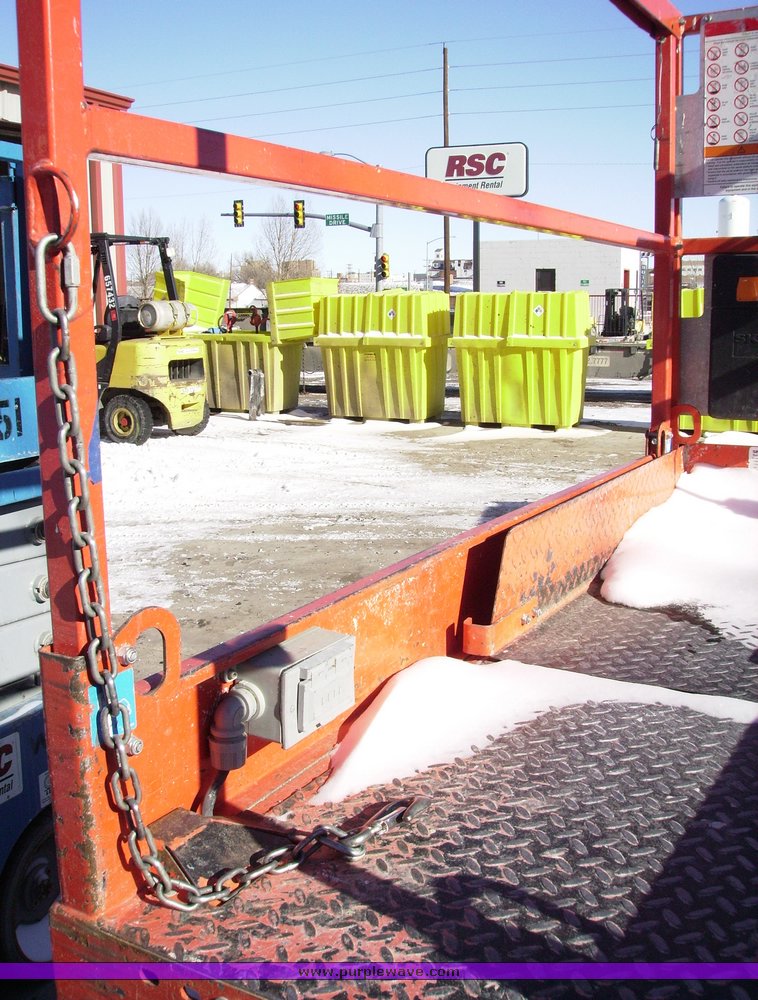 image for item 1100 2005 Skyjack SJIII-3219 scissor lift