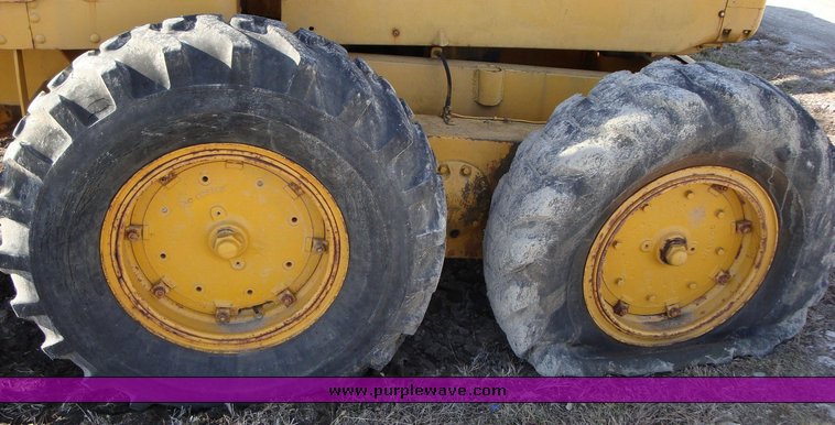 image for item 1202 Caterpillar 12 grader