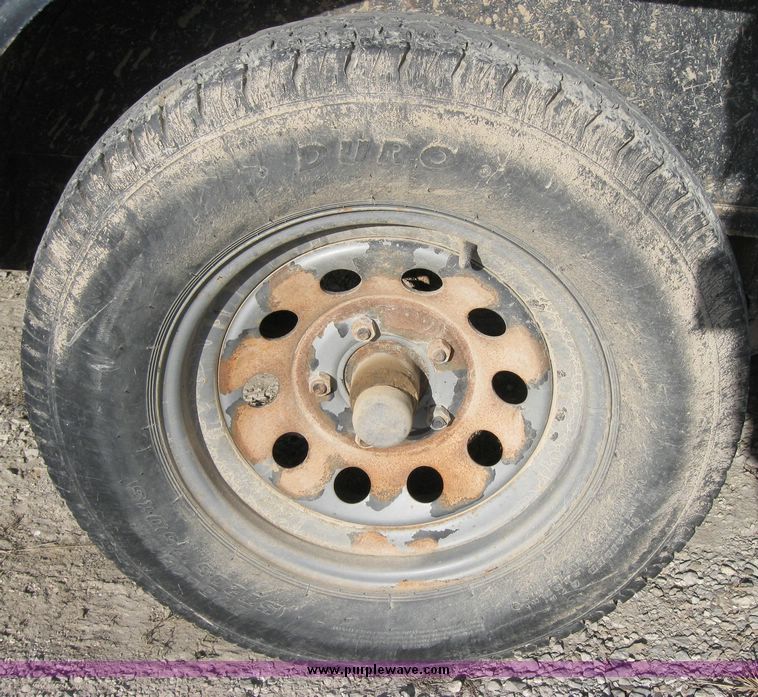 image for item 3256 1999 16' tandem axle trailer