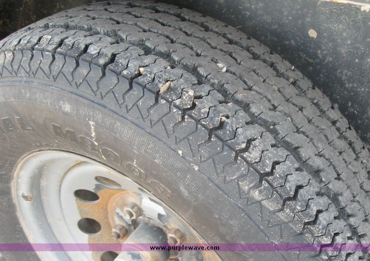 image for item 3256 1999 16' tandem axle trailer