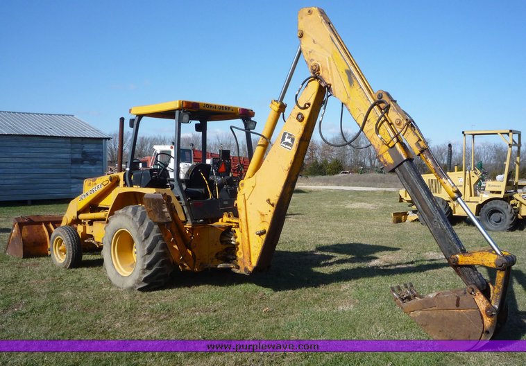 image for item 5084 1988 John Deere 510C backhoe loader