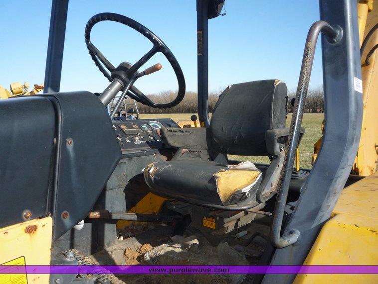image for item 5084 1988 John Deere 510C backhoe loader