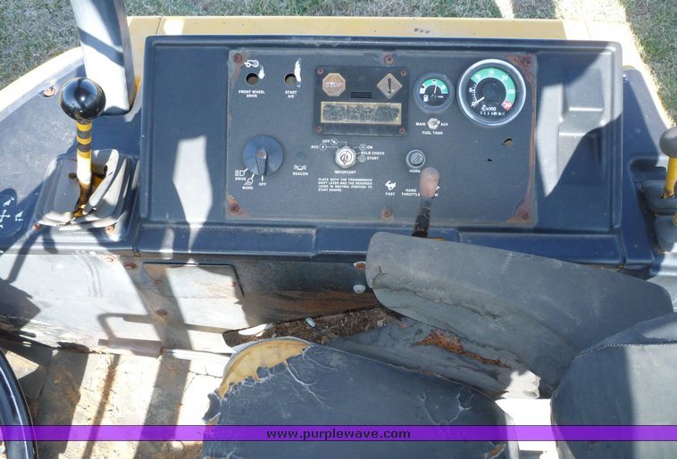 image for item 5084 1988 John Deere 510C backhoe loader