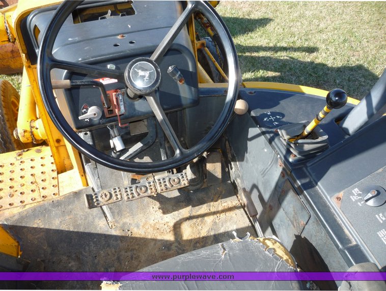 image for item 5084 1988 John Deere 510C backhoe loader