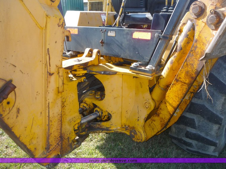 image for item 5084 1988 John Deere 510C backhoe loader