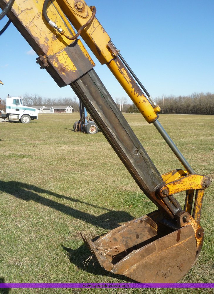 image for item 5084 1988 John Deere 510C backhoe loader