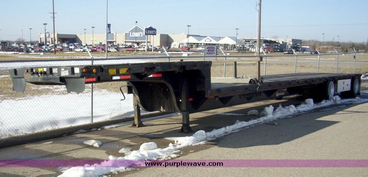 image for item 8069 1998 Utility 48' step deck tandem axle trailer