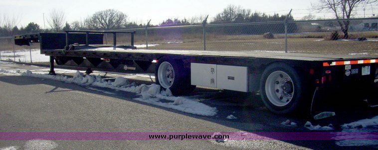 image for item 8069 1998 Utility 48' step deck tandem axle trailer