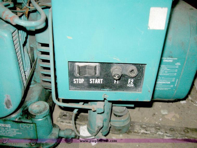image for item 5189 Onan generator with disconnect box