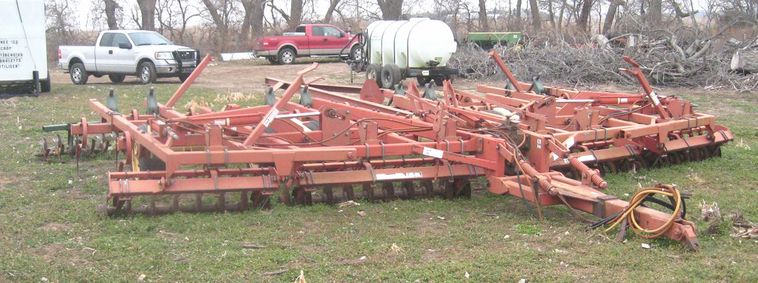 image for item 3799 Krause 3124 field cultivator with front trash disc and pickers
