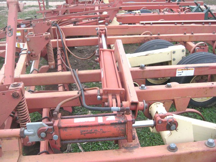 image for item 3799 Krause 3124 field cultivator with front trash disc and pickers