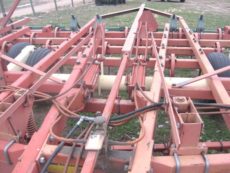 image for item 3799 Krause 3124 field cultivator with front trash disc and pickers