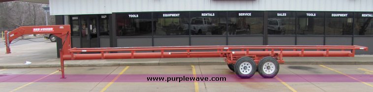 image for item 7035 Red Rhino 36' tandem axle round bale trailer