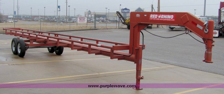 image for item 7035 Red Rhino 36' tandem axle round bale trailer