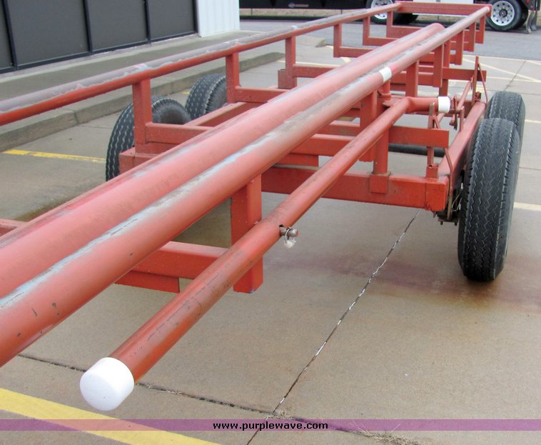 image for item 7035 Red Rhino 36' tandem axle round bale trailer