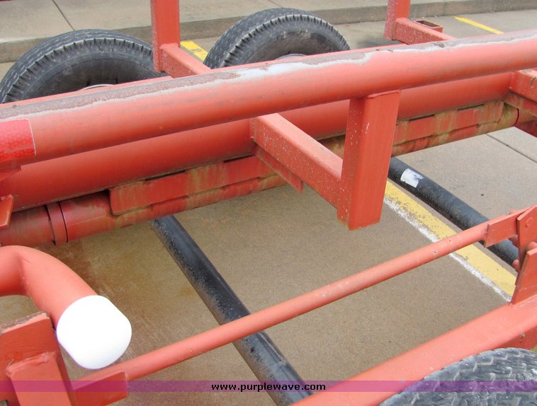 image for item 7035 Red Rhino 36' tandem axle round bale trailer